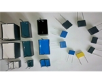 Cassette film capacitors with liquid epoxy potting compound